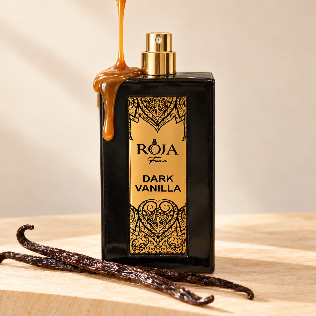 Roja Fume Dark Vanilla Extrait de Parfum with caramel drip and vanilla pods