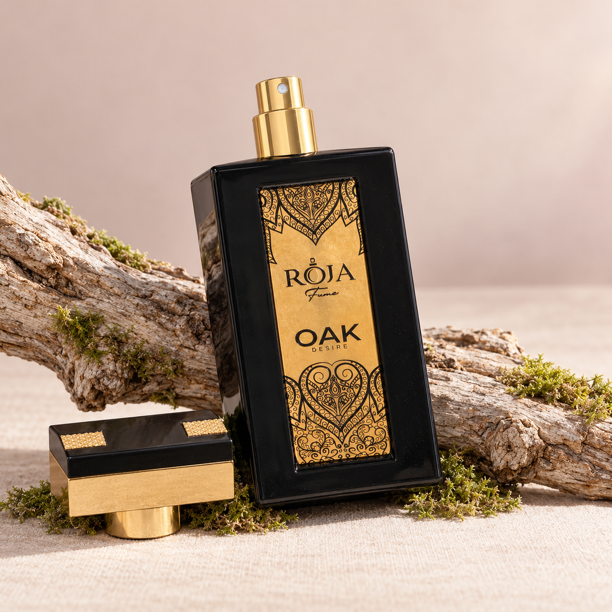 Roja Fume Oak Desire Extrait de Parfum on an oak branch with moss, cap beside
