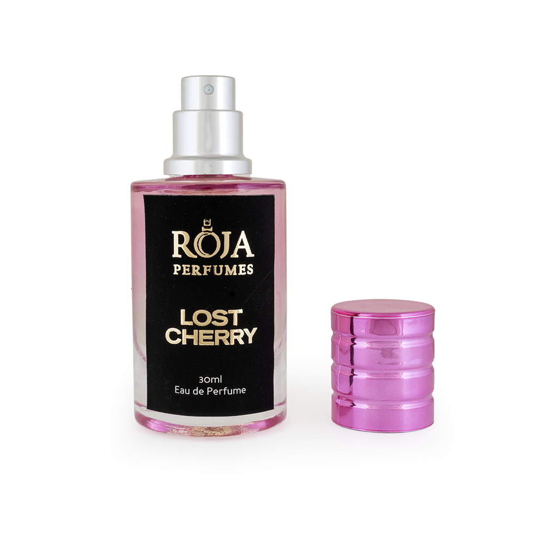 Roja Fume Lost Cherry perfume bottle with the cap off