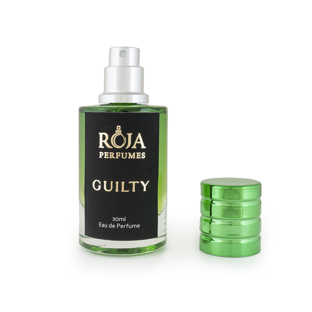 Roja Fume Guilty perfume bottle with the cap off