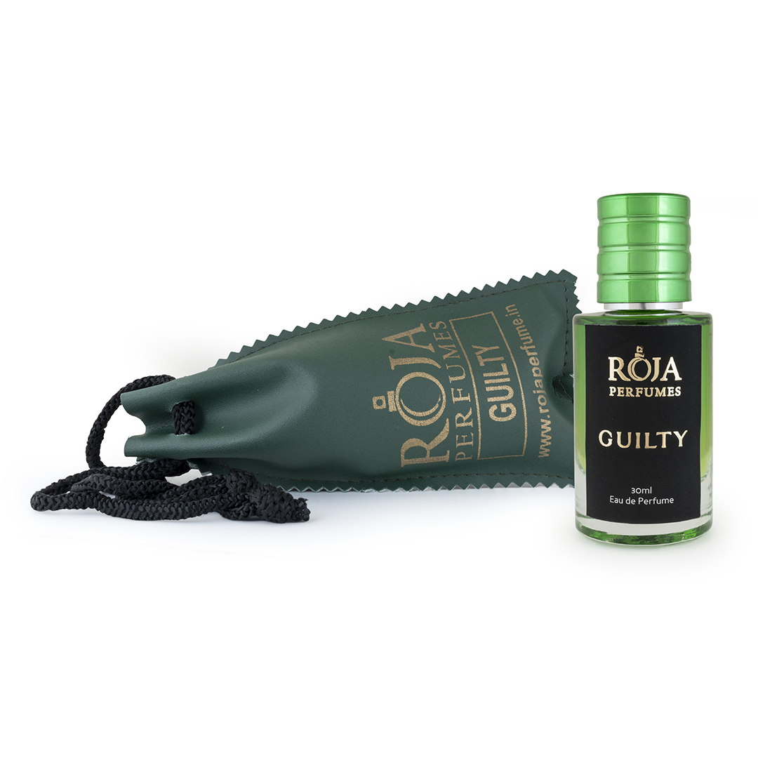 Roja Fume Guilty perfume bottle lying on its velvet pouch