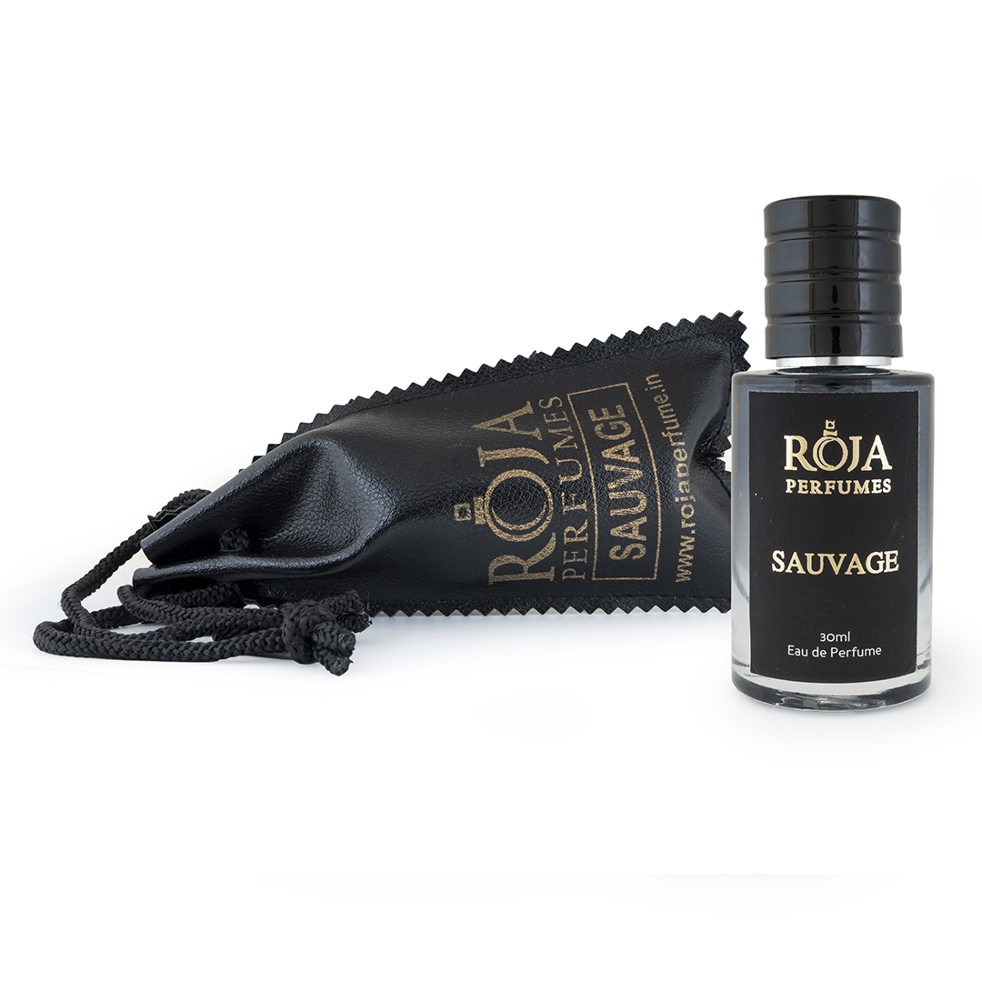 Roja Fume Sauvage perfume bottle lying on its velvet pouch